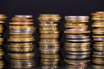 Stack Coins Over Black Background