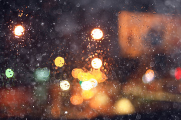 Fototapeta na wymiar blurred background night city lights flashing drops