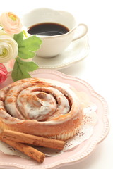 Cinnamon bun and coffee