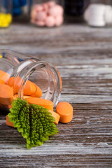 Various alternative and homeopatic pills in wooden containers