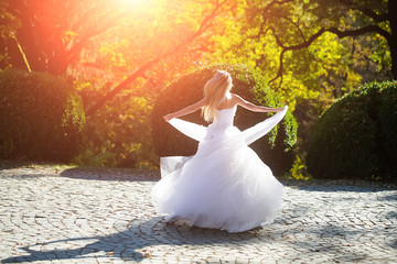 Fototapeta premium Bride in beautiful dress outdoor
