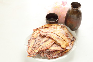 press octopus for Japanese snack food image with Sake alcohol drink