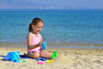 Real toddler girl enjoying her summer vacation