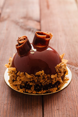 French mousse cake covered with chocolate glaze