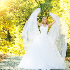 Bride in beautiful dress outdoor