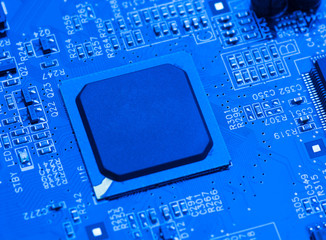 blue circuit board background of computer motherboard