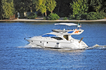 Fototapeta na wymiar Motorboat on the river
