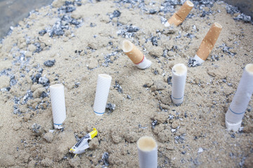 disposable cigarette in ashtray