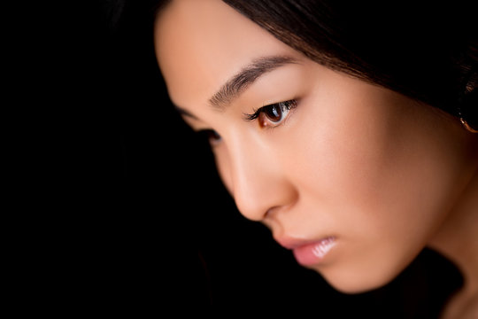 Close-up profile of asian lady in studio