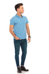Fototapeta premium man in blue shirt posing with one hand in pocket