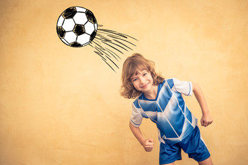Child is pretending to be a soccer player