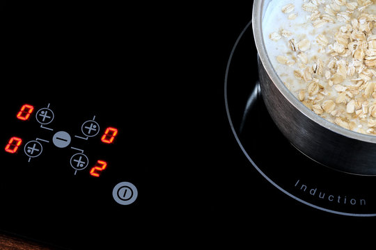 Induction stove, pot metal on it.