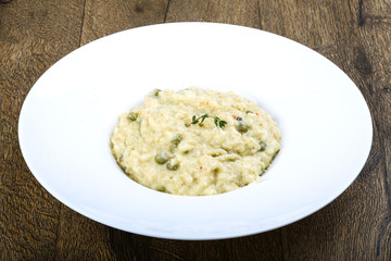 Risotto with cheese and green peas