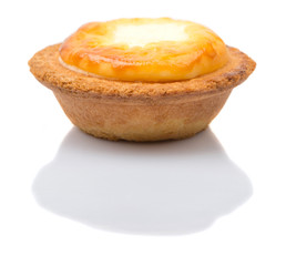 Homemade Japanese cheese tart over white background