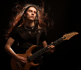 Fototapeta premium man playing electrical guitar