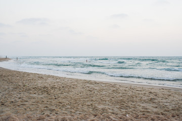 Fototapeta na wymiar Sea waves on tropical beach in natural harmony