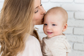 Happy mother with baby child