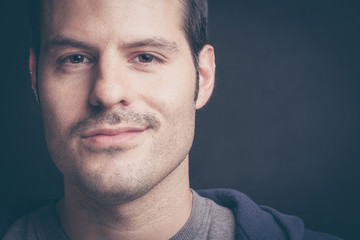 Young man with moustache
