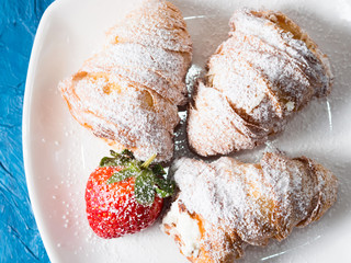 Croissants with icing sugar