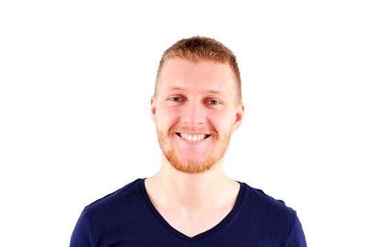 A smiling man on a white background