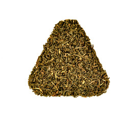 Top view of dried leaves of herbal green tea macro or close up formed in triangle or pyramid shape isolated on white background