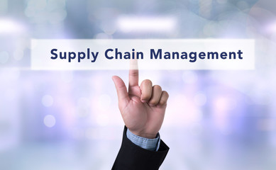 Business man with hand pressing a button on blurred abstract bac