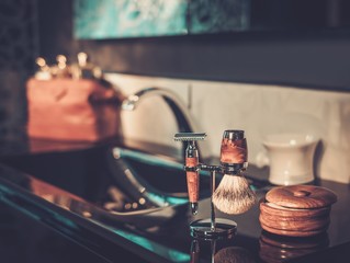 Gentleman's accessories in a luxury bathroom interior.