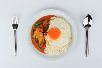 Fried pork curry, Stir fried pork and red curry paste with sunny side up egg (Moo Pad Prik Gaeng). Thai food.