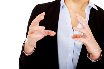 Business woman holding something or copyspase between two hands