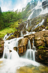 Fototapeta premium Tvindefossen Waterfall in Norway. Amazing and beautiful view.