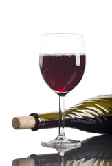 Used wine bottle and glass