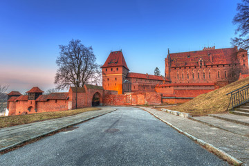 Fototapeta na wymiar The Castle of the Teutonic Order in Malbork at sunset, Poland