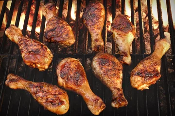 Gardinen BBQ Grilled Chicken Legs On The Hot Flaming Grill © Alex