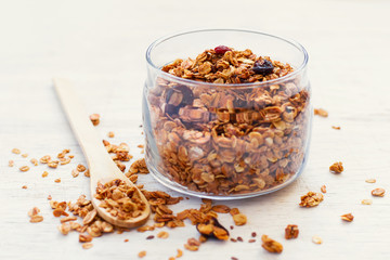 Freshly Granola on white background close-up, selective focus. h