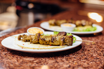 Meat kebab on the plate