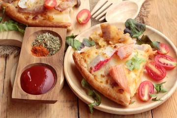 Italian pizza is delicious on wood background.