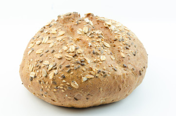Bun with sesame seeds and oat flakes