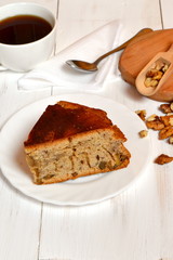 Cupcake with walnuts. Cup of coffee