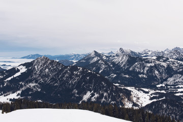 Fototapeta na wymiar Rugged alpine peaks under snow in winter