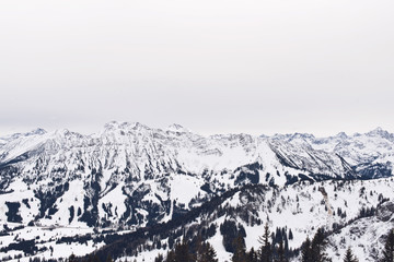 Fototapeta na wymiar Winter landscape of mountains under gray skies