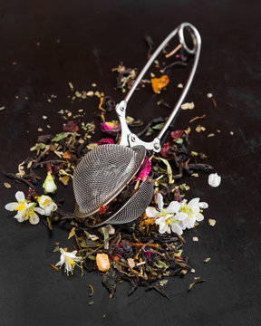 Herbal fragrant tea in tea strainer