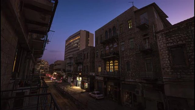 Day to night timelapse of the street in the city of Haifa, Israel