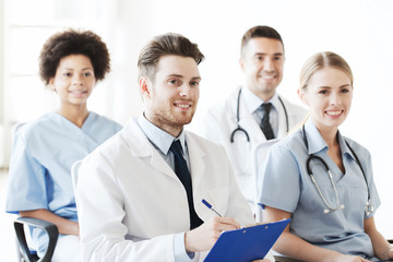 Fototapeta premium group of happy doctors on seminar at hospital