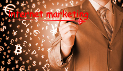 business man writing internet marketing