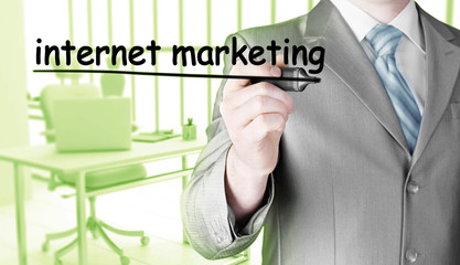 business man writing internet marketing