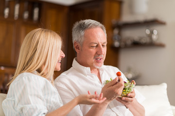 Couple eating a salad