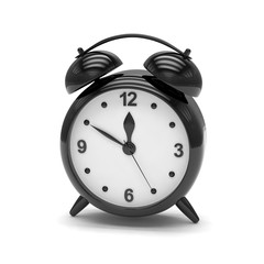 Black alarm clock on white