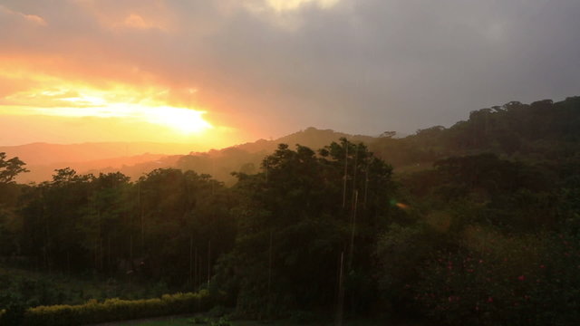View of sunset and rain at natural rainforest park of Costa Rica