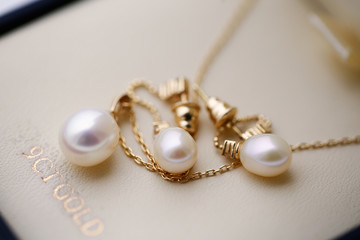 Beautiful pearls of bride's jewelry with selective focus