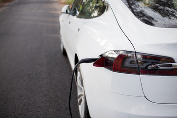 Electric car being charged